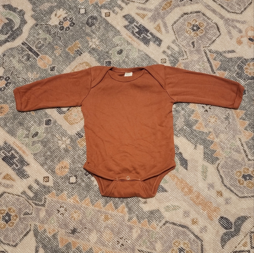 Kate Quinn long sleeved lap neck bodysuit in Copper 6-12 months